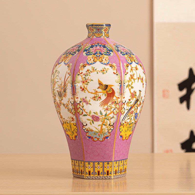 Elegant porcelain vase featuring intricate colorful enamel details and gold accents in a regal courtly style, displayed against a clean neutral background.